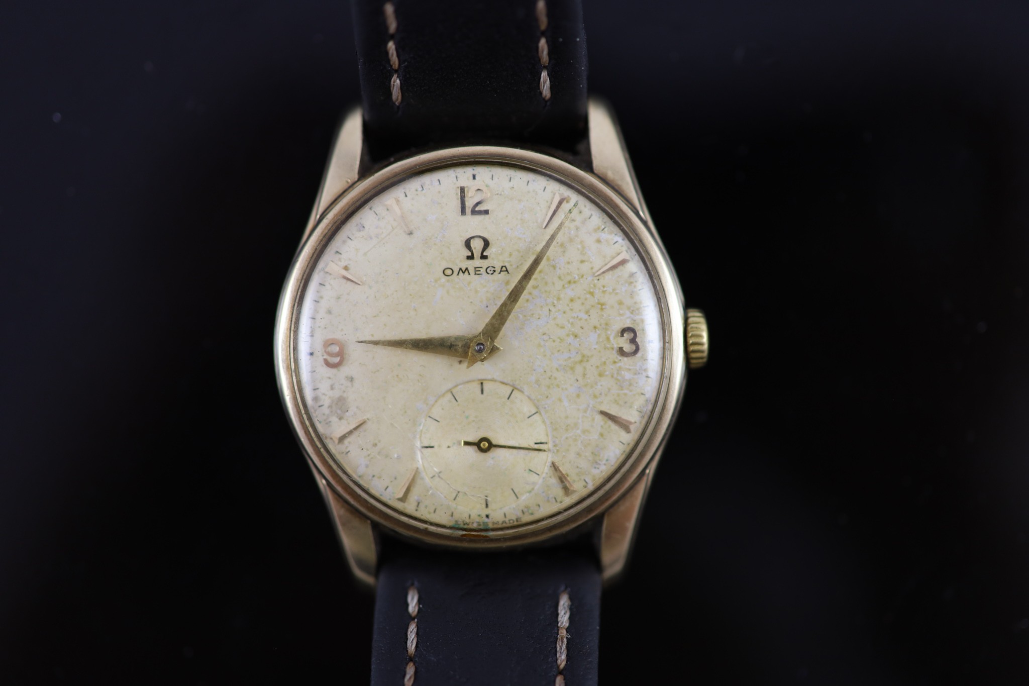 A gentleman's early 1960's 9ct gold Omega manual wind wrist watch